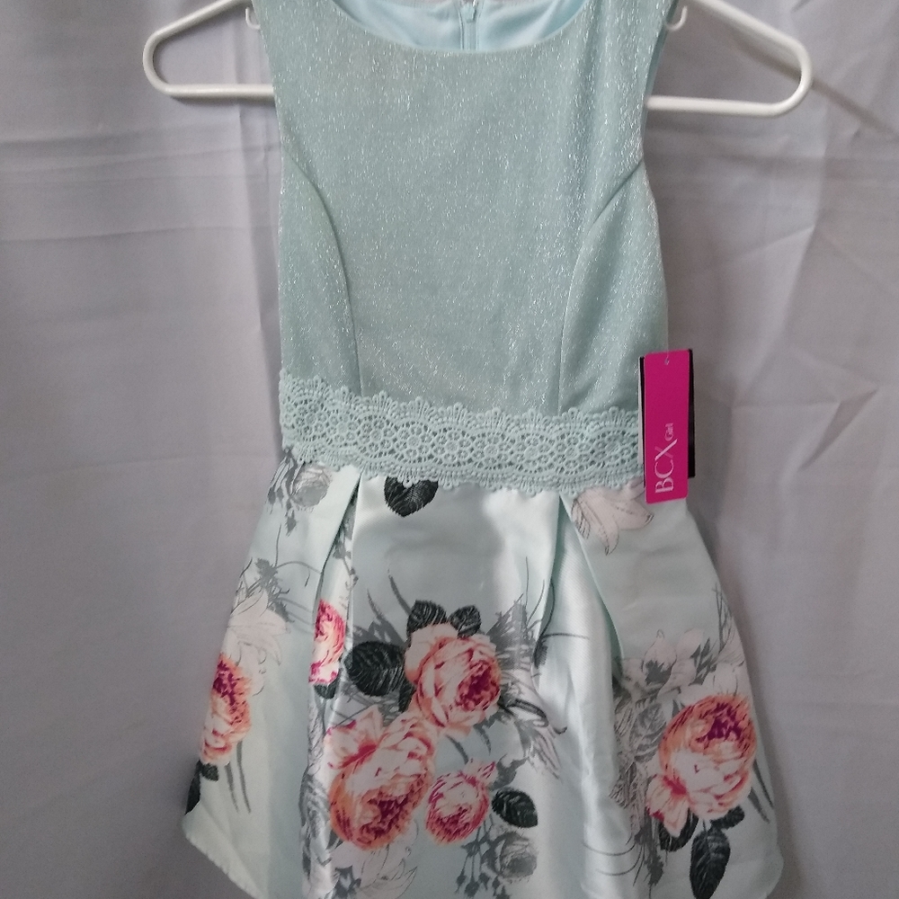 Girls size 8 bcx dress new with tags with a floral skirt